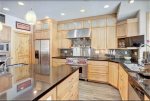 Create memorable meals in this Custom designed Chef Kitchen with quartz counters and just about anything you will need